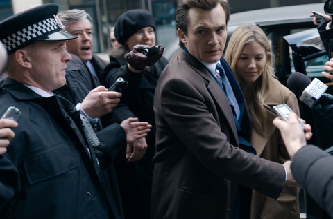 rupert friend and sienna miller dodge paparazzi attention in the netflix series anatomy of a scandal