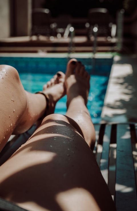 Sun tanning, Leg, Water, Pool, Swimming pool, Human leg, Leisure, Arm, Summer, Hand, 