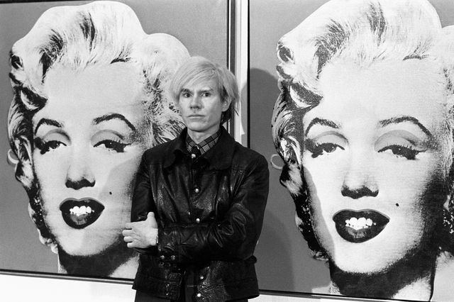 22021987 died on this day american pop artist and film maker andy warhol  america's pop art painter and film maker, andy warhol, stands in front of his double portrait of the late hollywood film star, marilyn monroe, at the tate gallery, millbank, at a press preview of his exhibition   photo by pa images via getty images