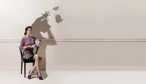 Human body, Human leg, Sitting, Wall, Dress, Knee, Comfort, Wall sticker, Bag, Foot, 