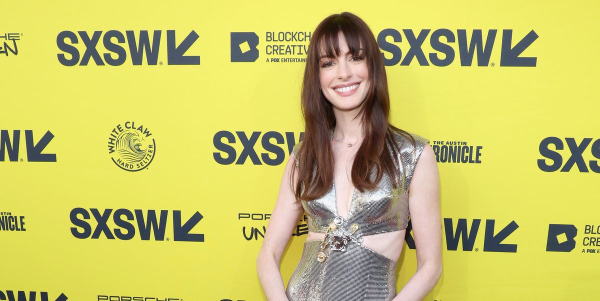 Anne Hathaway Wears Sexy Versace Cutout Dress In Sparkling Silver