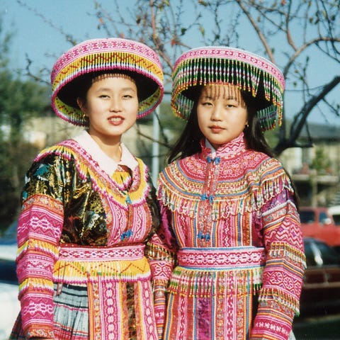 annie and her sister song in pink robes and pink beaded hats