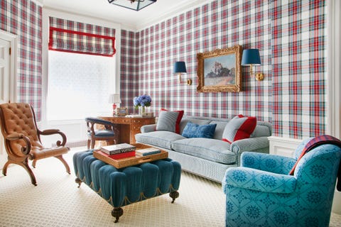 a radiant office is dressed in a lee jofa tartan pattern recolored specifically for this room and the armchair upholstery is inspired by an early american weaving and the leather chair is antique english