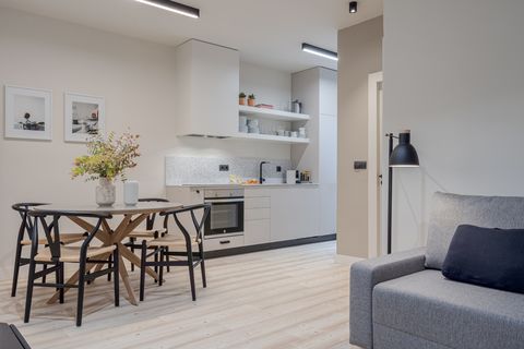 salón comedor y cocina de diseño moderno en un solo ambiente