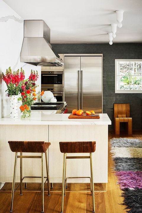 small kitchen with colorful runner