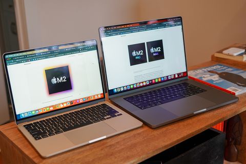 2 macbooks next to each other on a table
