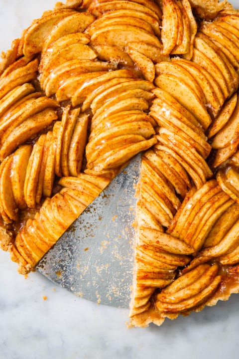 round french apple tart with a slice missing