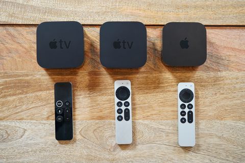 3 apple tv with remote on the table