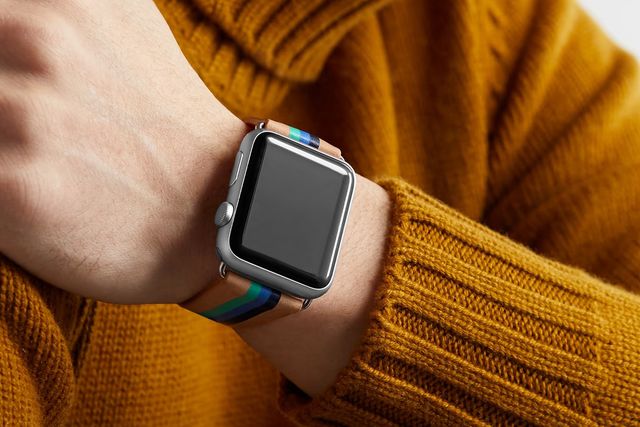 person wearing an apple watch and turtle neck