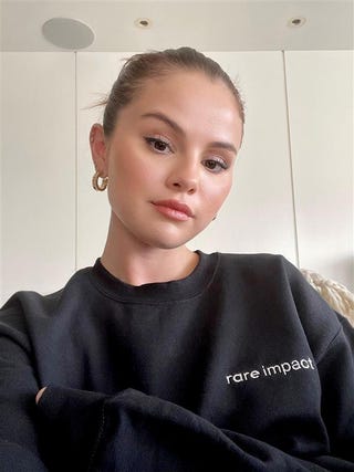 selena gomez in the rare beauty crewneck