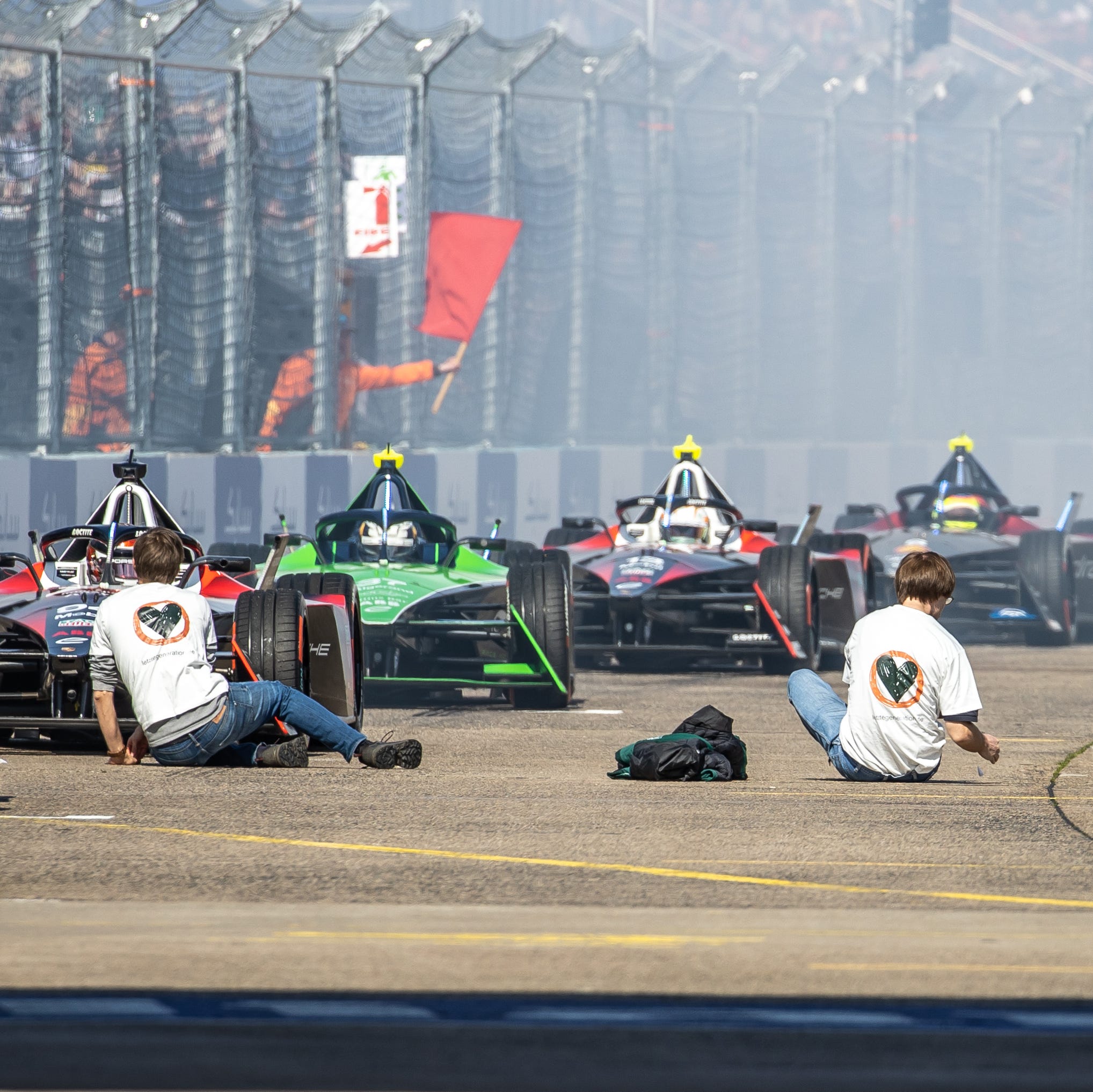 Formula E Protestors Jump Onto Hot Track, Delay Race