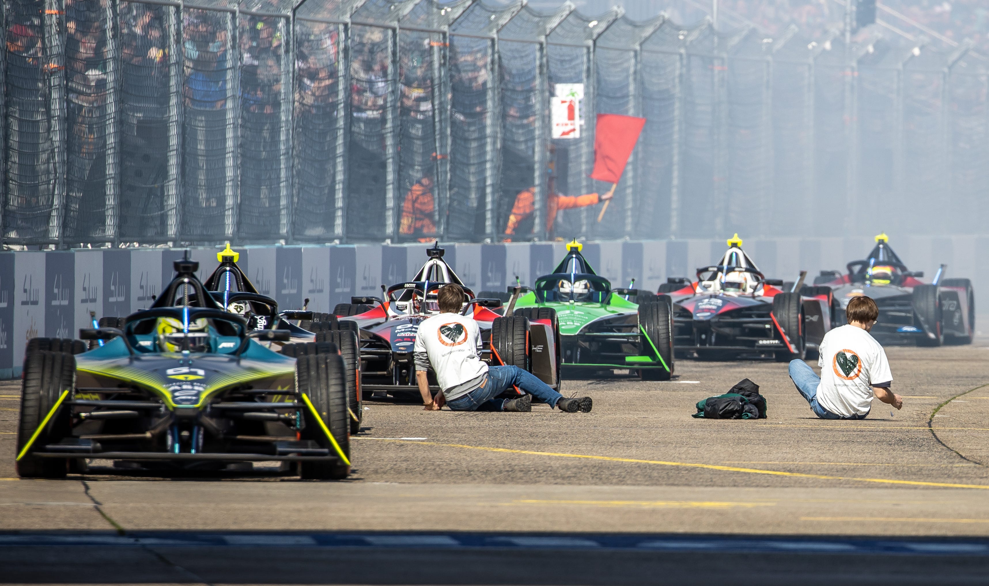 Crazy Times in Berlin: Protestors Jump Onto Formula E Hot Track, Delay Race