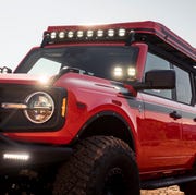 high performance off road parts designed by arb specifically for bronco two and four door are featured in this custom bronco badlands four door suv including airbag compliant front and rear bumpers, heavy duty rock sliders and differential cover, plus essential off road accessories like an arb twin compressor, jack and zero refrigeratorfreezer