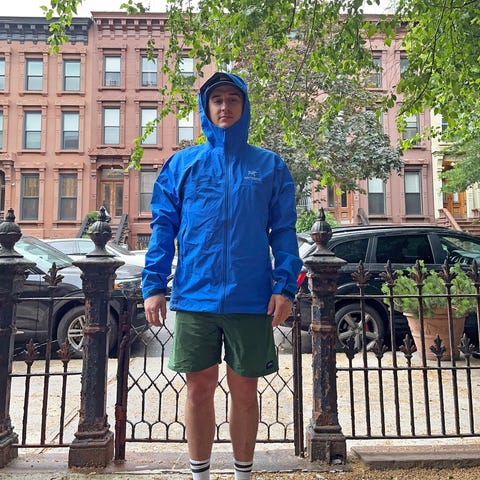 man wearing a blue arcteryx beta jacket