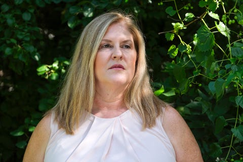 julie burkhart poses for a portrait at a park in wichita, kansas on august 28, 2021