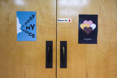 signs adorn the doors that lead to examination and operating rooms at trust women in wichita, kansas