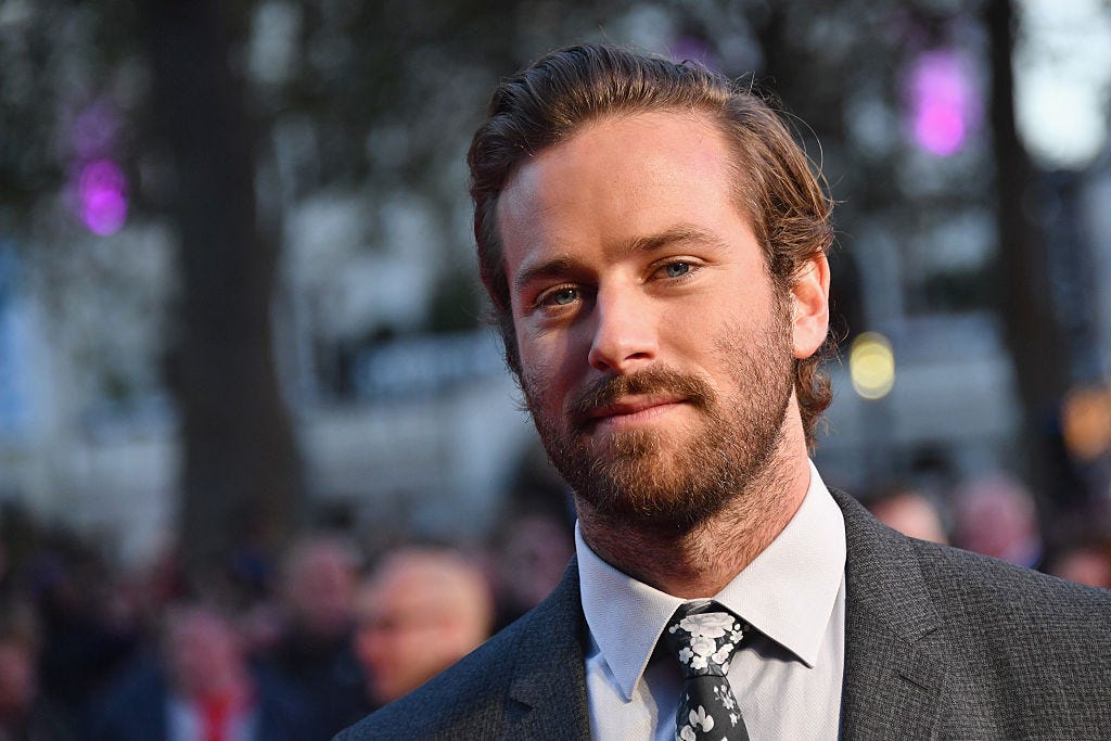 Is Armie Hammer working as a concierge at a hotel in the Cayman Islands?