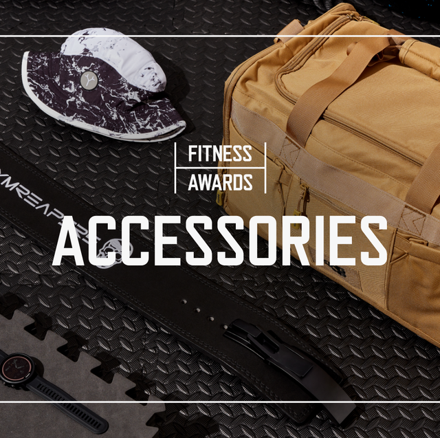 various fitness accessories laid out on black rubber gym flooring with text reading fitness awards accessories laid over top