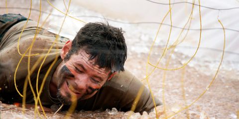 man army crawling through mud