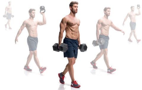 man carrying heavy dumbbells