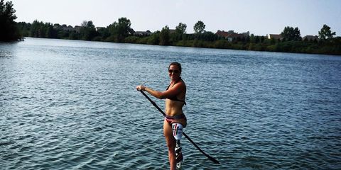 Stand-up paddleboard with prosthetic leg