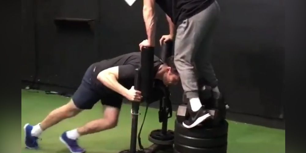 Watch Actor Jim Parsons Push a 725-Pound Weight Sled | Men's Health