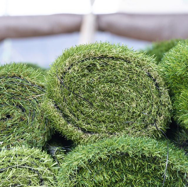 artificial synthetic grass rolled up in a store on display for sale