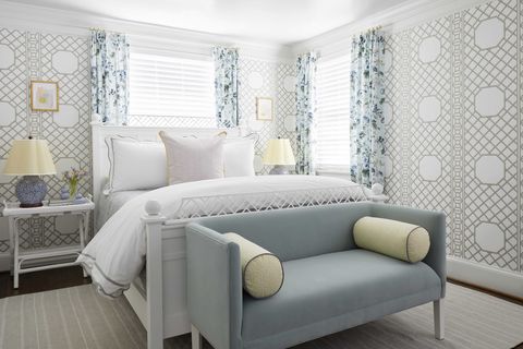 guest bedroom, blue seat, blue and white floral curtains