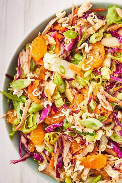 asian mandarin orange chicken salad with green onions, red cabbage, and ramen noodles
