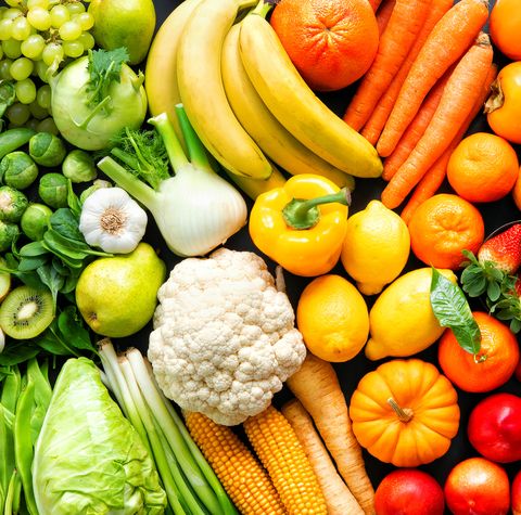 assortment of fresh organic fruits and vegetables in rainbow colors