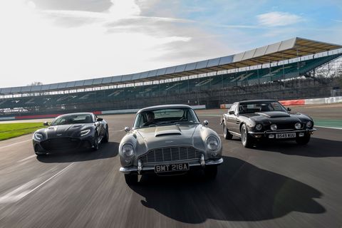 group of cars including the aston martin db5 from james bond no time to die
