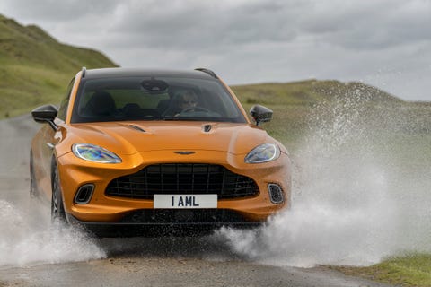 aston martin dbx takes on stream, wins