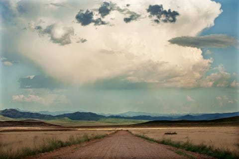 western sky, clouds, empty road