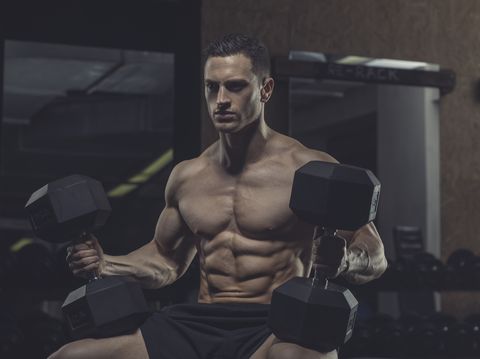 Athlete with dumbbells
