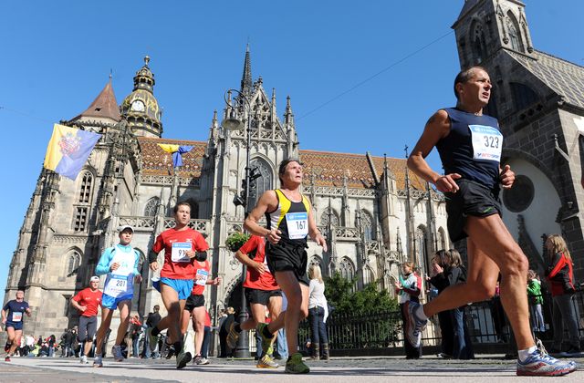 Athletes pass St. Elizabeth's Cathedral
