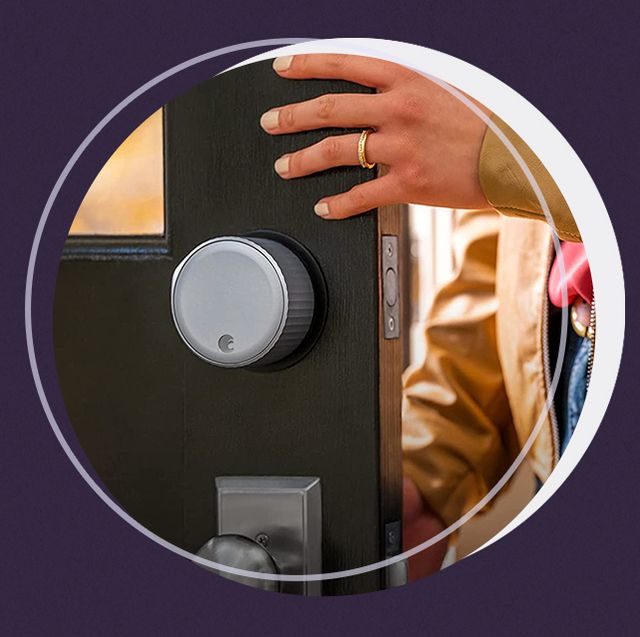 hand opening door with august smart lock on it