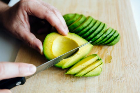 Avocado being cut avocado being cut