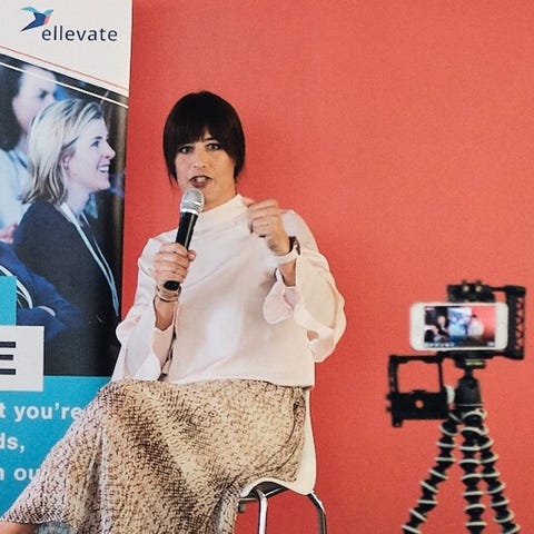 natalie egan speaking to an audience at a women's networking event, ellevate network courageous conversations, july 2019