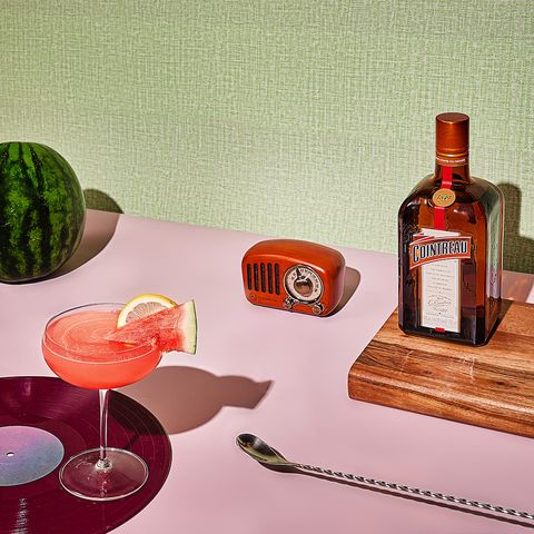 pink cocktail with watermelon wedge