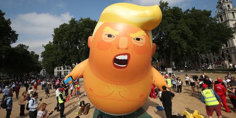 baby-trump-balloon-rises-after-being-inflated-in-londons-news-photo-997469886-1531486592.jpg
