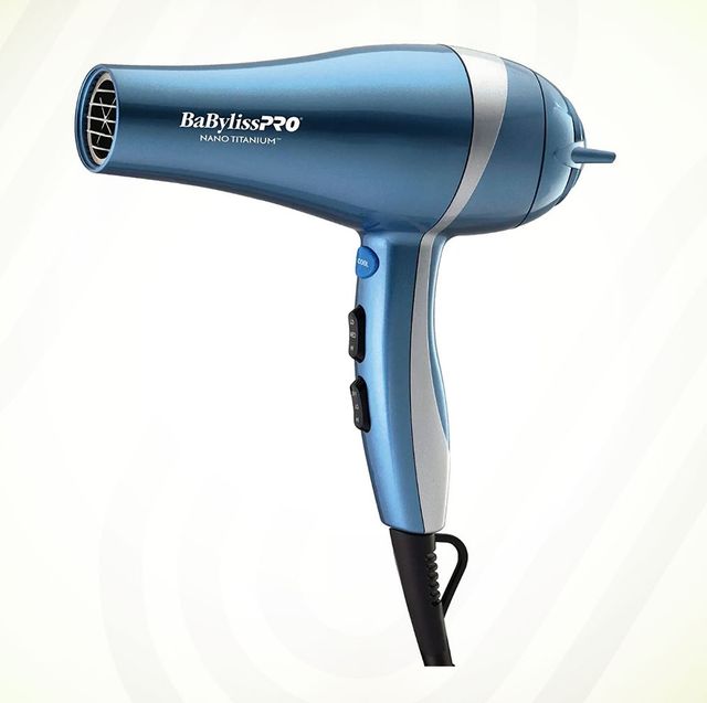 babyliss pro blue hair dryer against green background