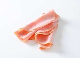 Bakken plakjes ham