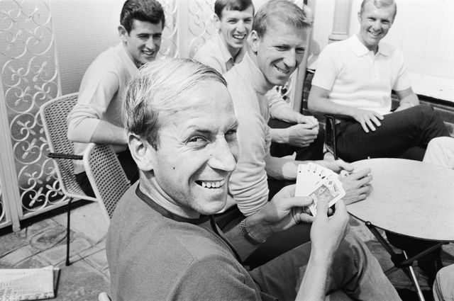 bobby charlton holds a full house in a game of cards with team mates, l r peter bonetti, martin peters, jack charlton and bobby moore as the england team relax at their base in hendon during the 1966 world cup tournament 10th july 1966 photo by daily mirrormirrorpixmirrorpix via getty images