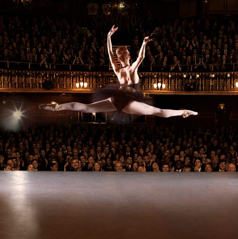 Ballet dancer performing on theater stage Ballet dancer performing on theater stage