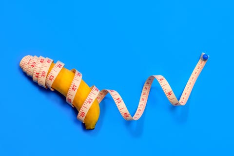 Banana andmeasuring tape on blue background banana andmeasuring tape on blue background