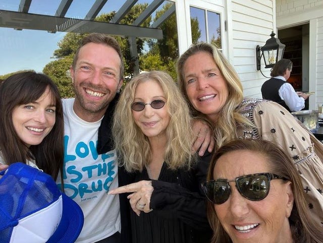 Dakota Johnson and Chris Martin together at Barbra Streisand's birthday dakota johnson and chris martin together at barbra streisand's birthday