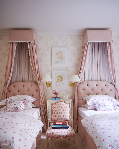 upholstered twin beds with pink headboards