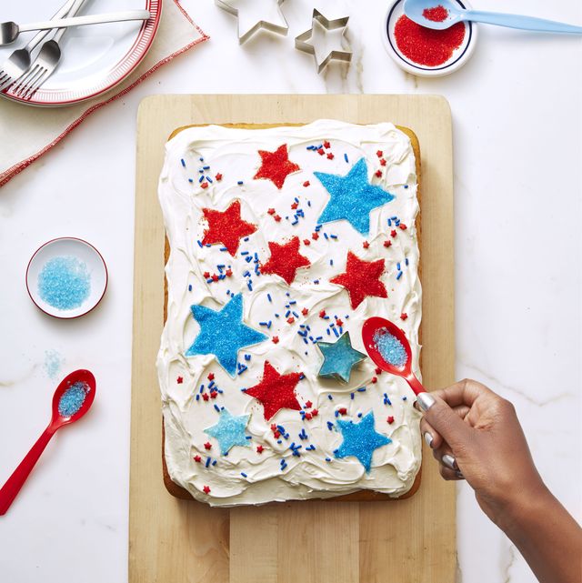 best ever vanilla cake with buttercream frosting and sprinkles in the shape of stars fourth of july themed cake