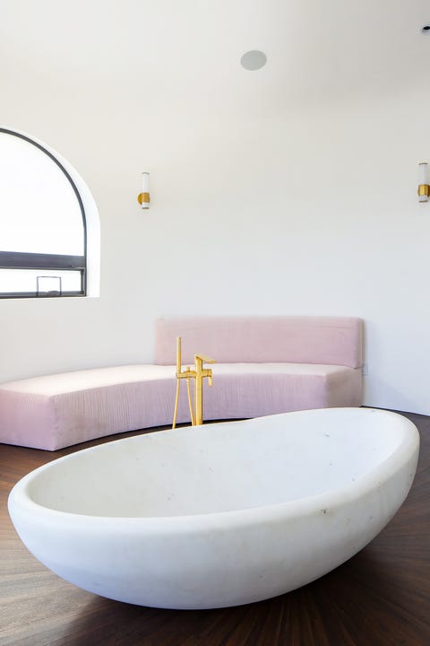 bathroom with semi circle sofa