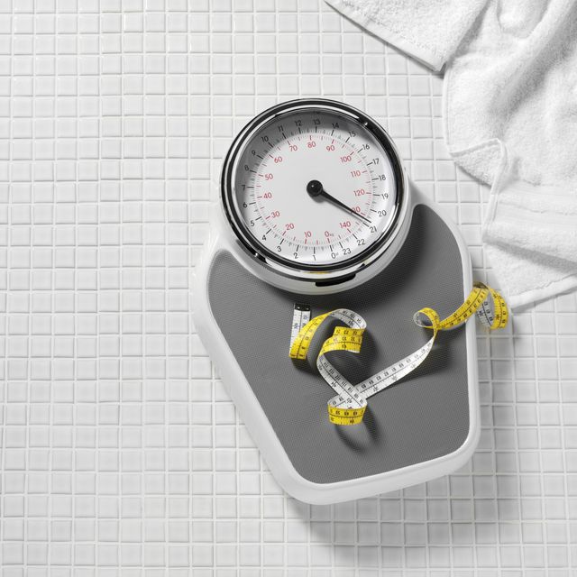 bathroom scales and tape measure